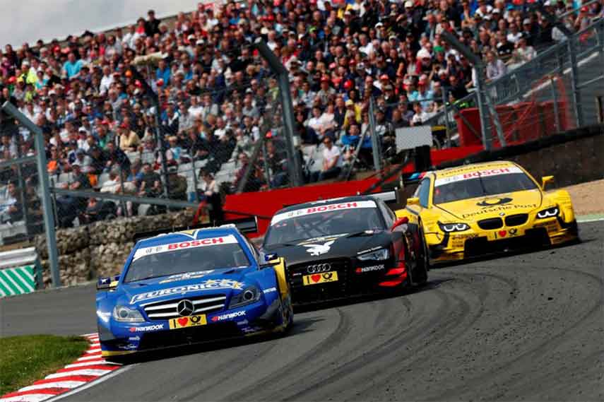 An image of Mercedes AMG, Audi and BMW DTM racing at Norisring