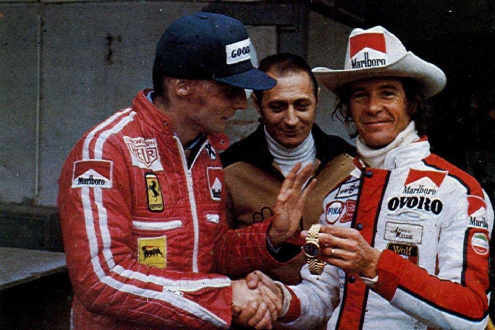 Niki Lauda thanks Arturo Merzario by giving him his Rolex