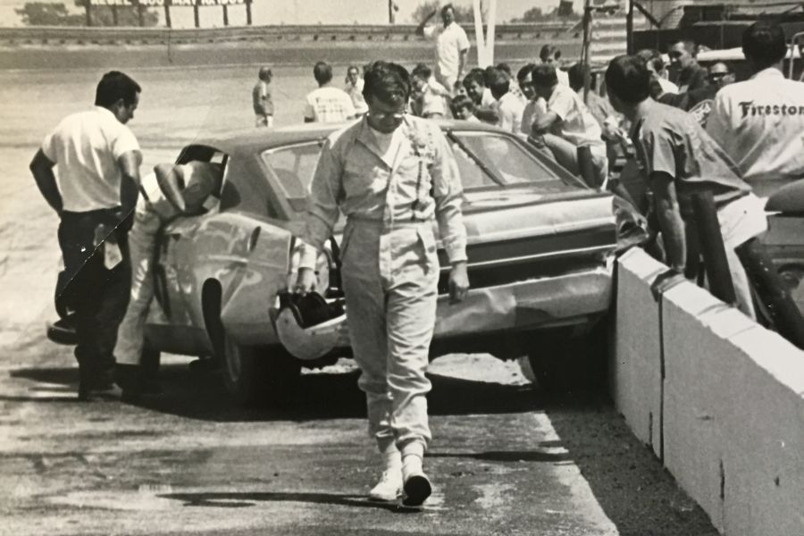 Driver walking away from the crash, Darlington Raceway, black and white