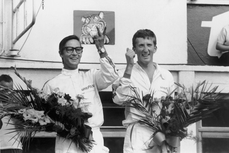 Masten Gregory, Jochen Rindt celebrating 1965 Le Mans victory, black and white