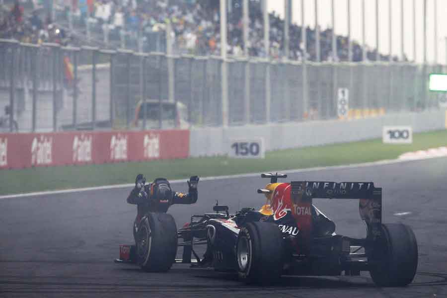 Sebastian Vettel after winning the Indian Grand Prix Red Bull RB9 Renault Infiniti 2013 racing engine Vettel Mark Webber formula grand prix race