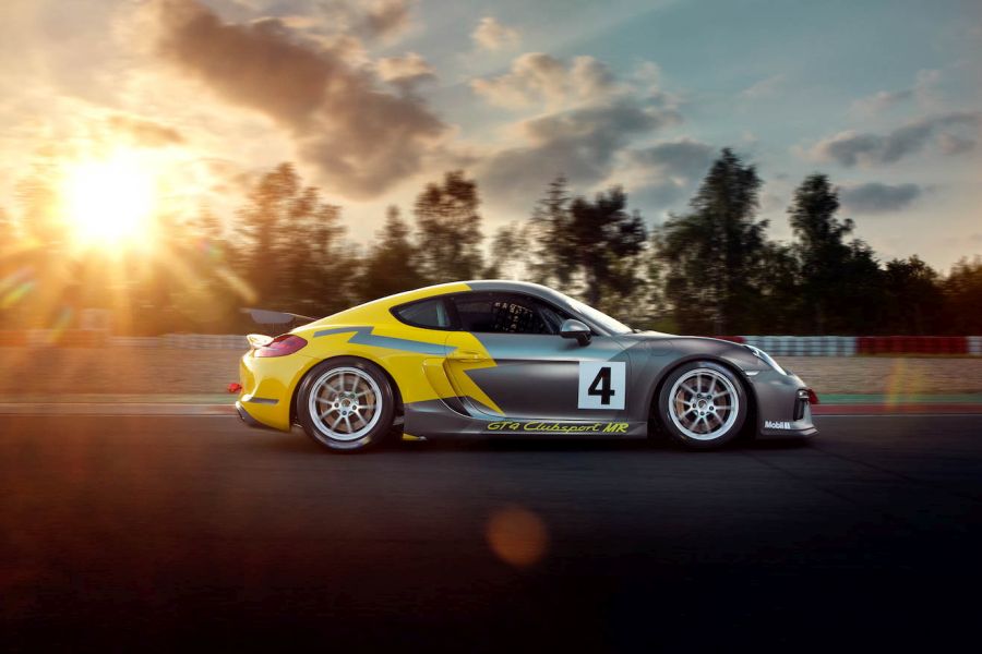 Porsche Cayman GT4 Clubsport on track, sunset, sideview, racing