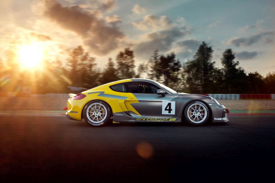 Cayman GT4 Clubsport in action Porsche Cayman GT4 Clubsport on track, sunset, sideview, racing