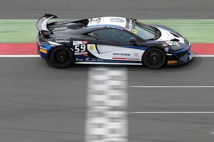McLaren 570S GT4 finishing a race Mclaren 570s gt4