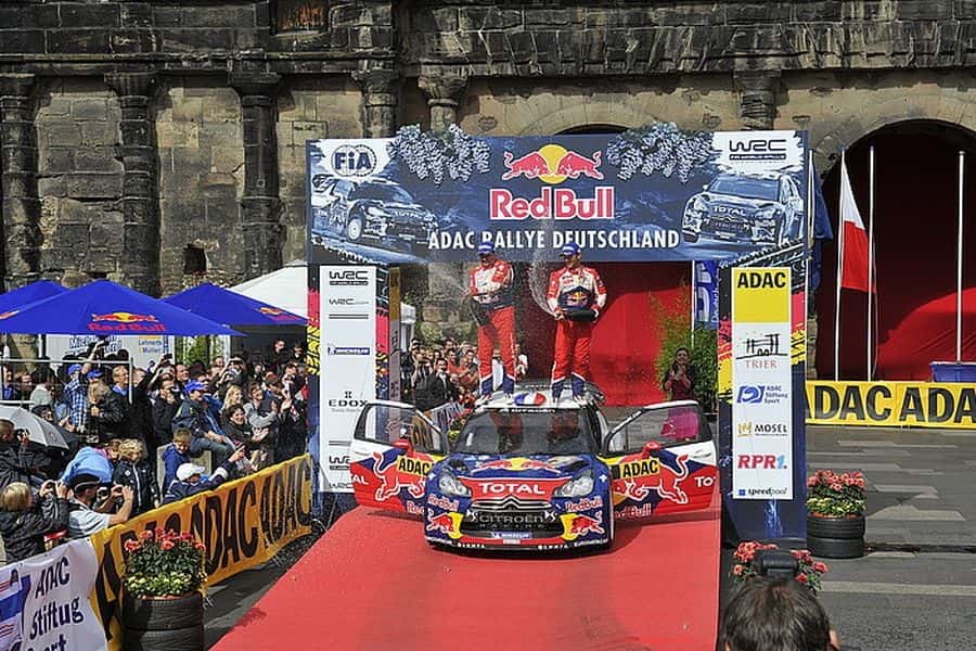 Sebastien Loeb and Daniel Elena celebrating their win 2012 ADAC Rallye Deutschland - ninth win for Sebastien Loeb and Daniel Elena