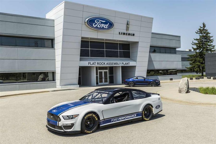 New Ford Mustang in front of Flat Rock assembly plant