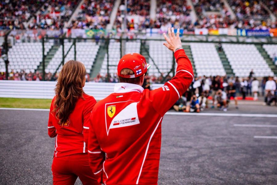 Kimi Raikkonen waving to fans