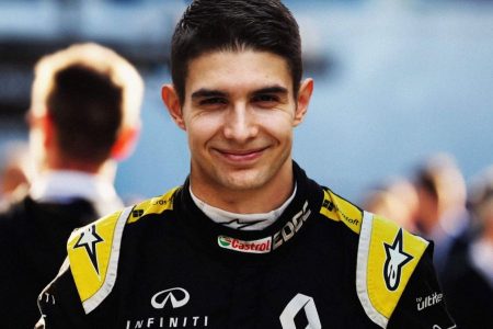 Esteban Ocon in a race car uniform
