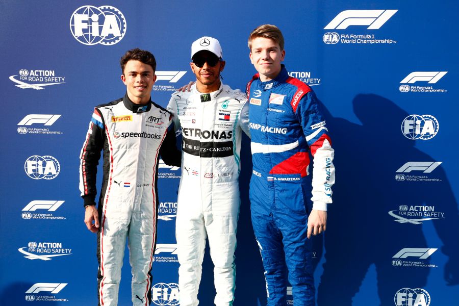 Three champions: Nyck de Vries (F2), Lewis Hamilton (F1) and Robert Shwartzman (F3)