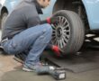 Mechanic Replacing A Tyre