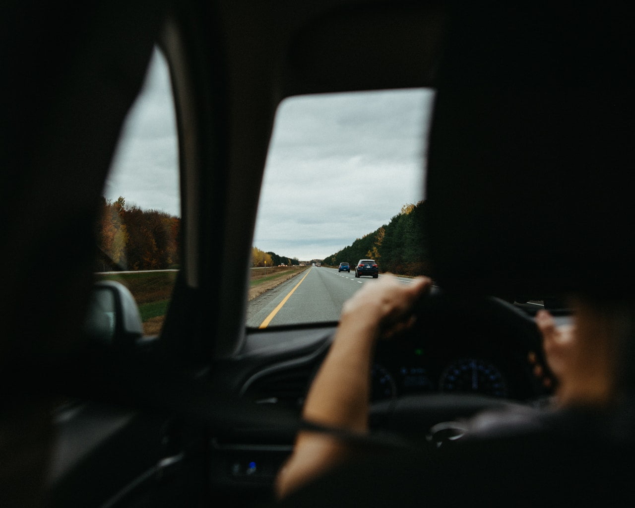 Woman Driving A Car