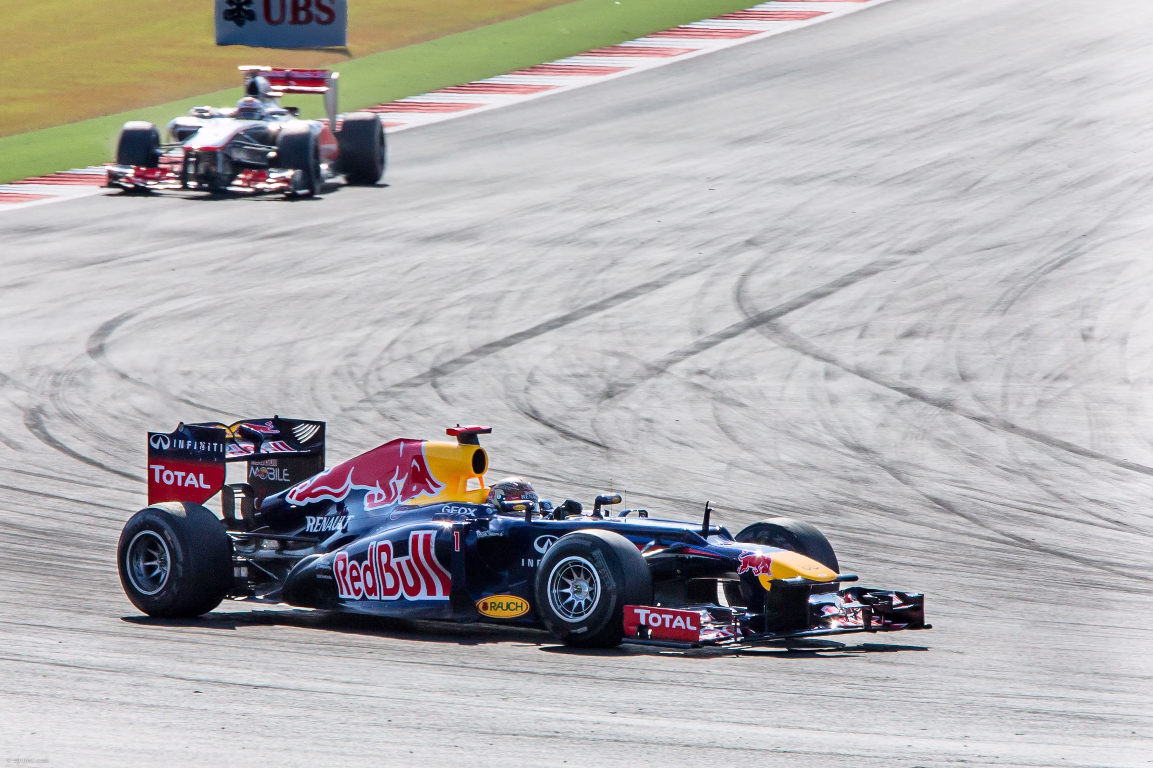 Formula 1 cars racing at Circuit of the Americas during the 2012 United States Grand Prix