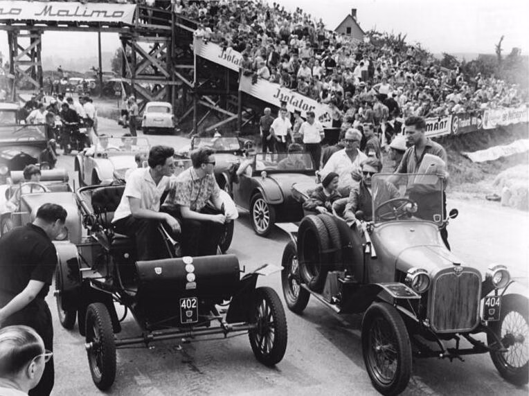 Vintage motorcycles on the Sachsenring road course during the 1967 international veteran rally for the circuit's 40th anniversary