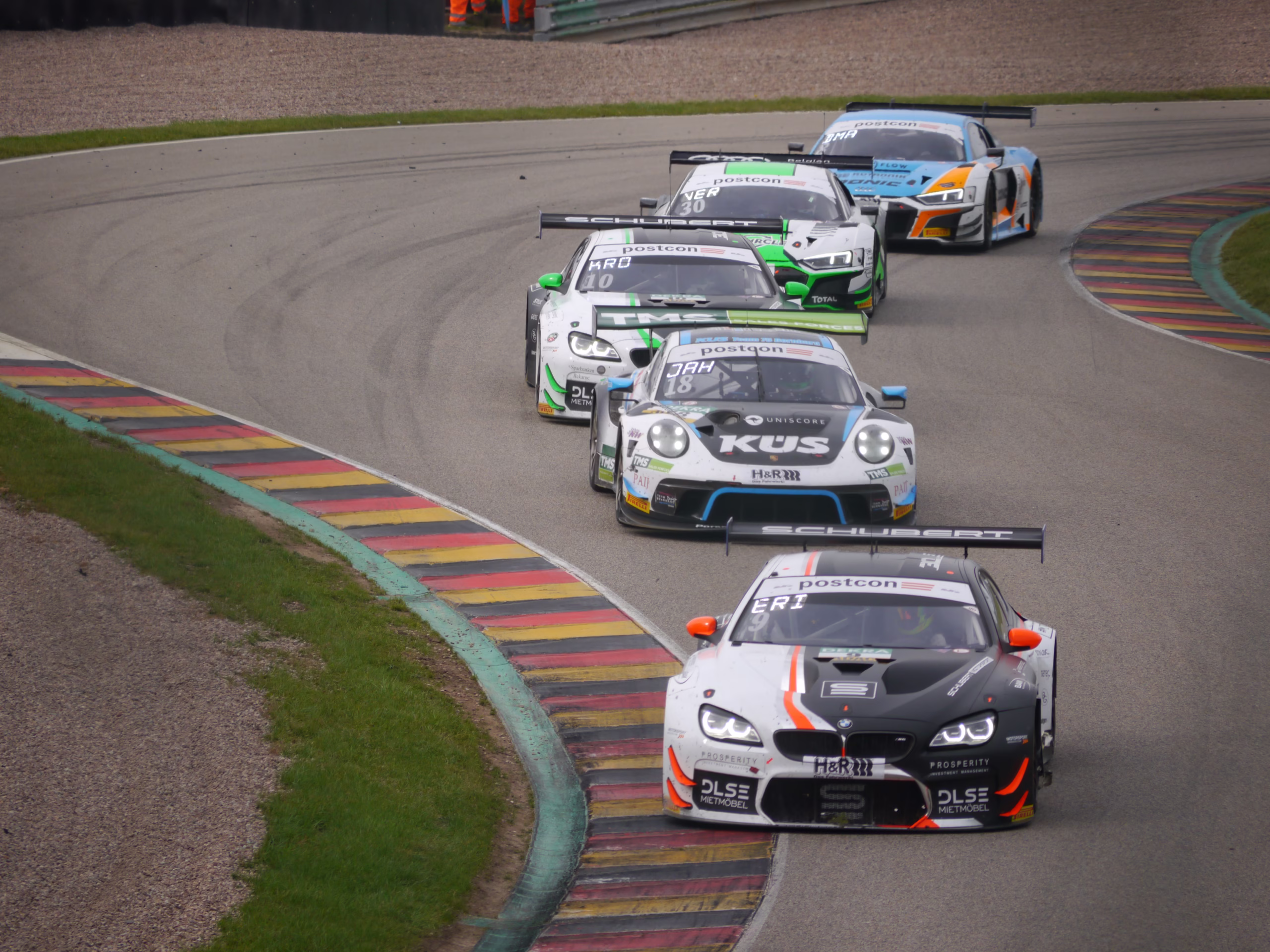GT racing cars competing in the ADAC GT Masters at Sachsenring in 2020